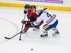 Taylor Hall, seen here battling Wild forward Mikko Koivu for the puck Tuesday in St. Paul, Minn., says the scores this season indicate the team is close to the best in the league. (USA TODAY SPORTS)