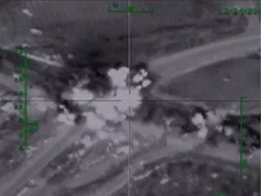 A frame grab taken from a footage released by Russia's Defence Ministry October 28, 2015, shows what Russia says is smoke rising after air strikes carried out by the Russian air force on a militants' ammunition depot on a highway between Hama and Aleppo, Syria. Russia's air force flew 71 sorties over Syria in the last two days, carrying out 118 strikes on militant targets, RIA news agency quoted the Russian Defence Ministry as saying on Wednesday. REUTERS/Ministry of Defence of the Russian Federation/Handout via Reuters