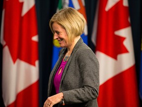 Premier Rachel Notley leaves a press conference at the Alberta Legislature in Edmonton, Alta., on Monday October 26, 2015. The Alberta goverment will introduce Budget 2015 on Tuesday. Ian Kucerak/Postmedia Network