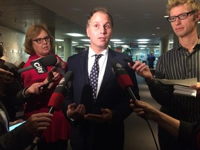 TTC chair Josh Colle speaks to reporters after the commission voted to take Bombardier to court over streetcar delivery Wednesday, Oct. 28, 2015. (Don Peat/Toronto Sun)