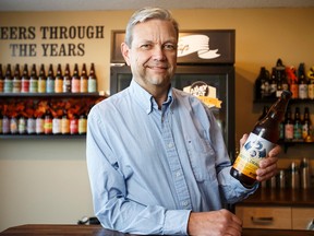 Neil Herbst, co-owner of Alley Kat Brewing Company, poses for a photo at the brewery at 9929-60th Ave in Edmonton, Alta., on Wednesday October 28, 2015. The Alberta government has changed the way breweries are taxed. Ian Kucerak/Edmonton Sun