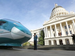 In this Feb. 26, 2015 photo, a full-scale mock-up of a high-speed train is displayed at the Capitol in Sacramento, Calif. A newspaper analysis concludes California's ambitious Los-Angeles-to-San-Francisco high-speed rail project will likely miss its 2022 deadline and go over its $68 billion budget. AP Photo/Rich Pedroncelli
