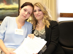 Erika Crawford, (left) 20, of Brantford, and Brooklyn Mills, 22, (right) of Oakville, both suffer from rare Ehlers-Danlos syndrome. (Antonella Artuso/Toronto Sun)