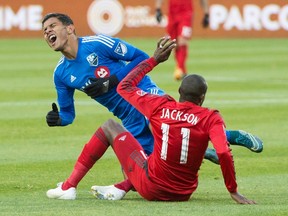 Montreal Impact’s Johan Venegas, left, challenges Toronto FC’s Jackson during MLS action in Montreal, Sunday, October 25, 2015. (THE CANADIAN PRESS/Graham Hughes)