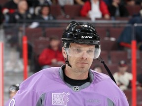 Milan Michalek #9 of the Ottawa Senators wears a lavender jersey to show support on Hockey Fights Cancer awareness night prior to the start of an NHL game against the Calgary Flames at Canadian Tire Centre on October 28, 2015 in Ottawa, Ontario, Canada.  Jana Chytilova/Freestyle Photography/Getty Images/AFP