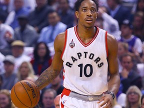 DeMar DeRozan of the Toronto Raptors runs the ball on the Indiana Pacers during NBA action at the Air Canada Centre in Toronto on Oct. 28, 2015. (Dave Abel/Toronto Sun/Postmedia Network)