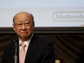 Nintendo Co. Chief Executive Tatsumi Kimishima attends a news conference in Tokyo, Japan, on Oct. 29, 2015. Japan's Nintendo Co. announced on Thursday it was pushing back the launch of its videogame service for smartphones to March 2016, a much-awaited move announced by its previous CEO who died earlier this year. (REUTERS/Toru Hanai)