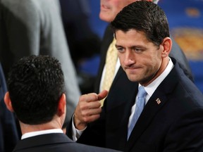 Rep. Paul Ryan, right, talks with  Rep. Jason Chaffetz on the floor prior to the start of the election for the new Speaker of the U.S. House of Representatives in the House Chamber in Washington on Oct. 29, 2015. (REUTERS/Jonathan Ernst)