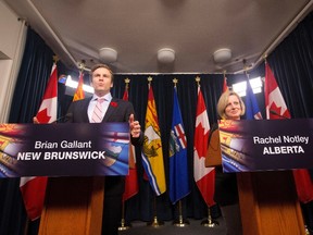 Alberta Premier Rachel Notley and New Brunswick Premier Brian Gallant speak with media after a meeting in Edmonton Alta, on Thursday October 29, 2015. THE CANADIAN PRESS