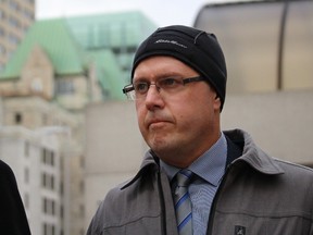 Disgraced teacher Phillip Nolan leaves the Ottawa courthouse on Thursday, Oct. 29, 2015 after pleading guilty to counts of sexual interference involving a 13-year-old former student. Nolan was an award-winning teacher and played drums in Prime Minister Stephen Harper's band. (TONY SPEARS/Ottawa Sun/Postmedia Network)