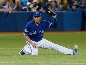 Blue Jays third baseman Josh Donaldson catches the ball off the bat of Royals outfielder Alex Gordon during Game 3 of the AL Championship Series in Toronto on Monday, Oct. 19, 2015. (Stan Behal/Toronto Sun)