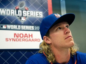 New York Mets starting pitcher Noah Syndergaard talks during World Series media day Monday, Oct. 26, 2015, in Kansas City, Mo. (AP Photo/Charlie Riedel)