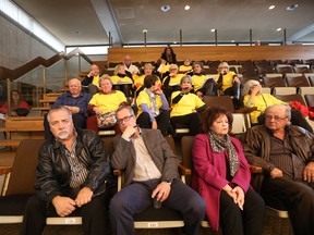 A group of individuals opposed to the construction of a clinic on Academy Road attended City Hall today.  The group, many of whom wore yellow shirts, mixed with members of the public, in the public gallery Thursday, October 29, 2015.