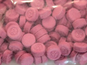 A sample of the drug known as Ecstasy is shown at a press conference in Calgary, AB January 11, 2012. SUN FILES