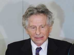 In this Wednesday, Feb. 25, 2015 file photo director Roman Polanski speaks to the press after a hearing concerning a U.S. request for his extradition over 1977 charges of sex with a minor, at the regional court in his childhood city of Krakow, Poland. (AP Photo/Alik Keplicz, File)