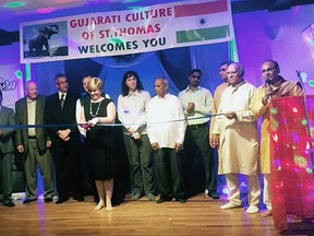 Elgin-Middlesex-London PC MP-elect Karen Vecchio cuts a ribbon Saturday during a Hindu harvest festival, to inaugurate a new community organization, Gujarati Culture of St. Thomas.