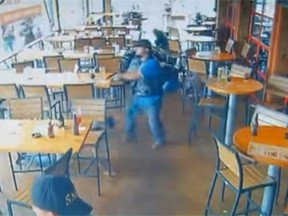 Surveillance footage captured the chaos at a deadly biker shootout outside a Waco, Texas, restaurant in May. (YouTube screengrab)