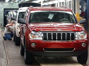 New 2005 Jeep Grand Cherokees sit on the assembly line for inspection during their production launch celebration at the Jefferson North Assembly Plant in Detroit, Michigan, in this file image from August 25, 2004. (REUTERS/Rebecca Cook/Files)
