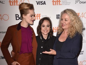 From left, actress Evan Rachel Wood, actress Ellen Page and director Patricia Rozema attend the Into the Forest premiere during the Toronto International Film Festival Sept. 12, 2015 in Toronto. The film is set to open the South Western International Film Festival Thursday in Sarnia, where Rozema grew up. (Kevin Winter/Getty Images/AFP)