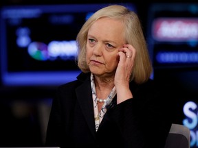 In this Aug. 21, 2014, file photo, Meg Whitman, CEO of Hewlett-Packard, is interviewed on the floor of the New York Stock Exchange in New York. Hewlett-Packard, one of the nation's most storied tech companies will split in two this weekend of Oct. 31, 2015, another casualty of seismic shifts in the way people use technology and big-company sluggishness in responding. (AP Photo/Richard Drew, File)