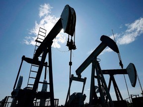 Pumpjacks at work pumping crude oil near Halkirk, Alta., June 20, 2007. THE CANADIAN PRESS/Larry MacDougal