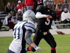 Northern Vikings quarterback Kobe Lundy tosses the ball during the senior boy's high school football game against the Ursuline College Lancers on Friday October 30, 2015 in Sarnia, Ont. (Terry Bridge, The Observer)