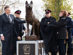 A monument honouring the memory of all fallen EPS Police Service Dogs is unveiled at the Vallevand Kennels, 12211 - 124 Avenue, in Edmonton Alta. on Friday Oct. 30, 2015. David Bloom/Edmonton Sun