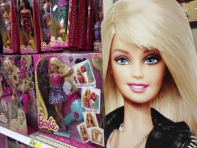 Barbie dolls are shown in the toy department of a retail store in Encinitas, California in this October 14, 2014, file photo. REUTERS/Mike Blake/Files
