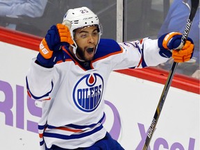 Edmonton Oilers' Darnell Nurse celebrates his first goal in the third period of an NHL hockey game against the Minnesota Wild, Tuesday, Oct. 27, 2015, in St. Paul, Minn. The Wild won 4-3. (AP Photo/Jim Mone)