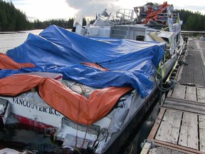 The Leviathan II whale-watching vessel sits at a dock after it was raised and towed from the Tofino, B.C., area on Friday, Oct. 30, 2015. The 20-metre-long ship has been towed to a secure location, where it will be monitored by the RCMP. THE CANADIAN PRESS