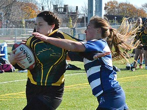 Hair-raising action between Centennial and Quinte at Friday's Bay of Quinte girls rugby championships at MAS Park Field 2. (Catherine Frost for The Intelligencer)