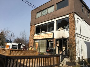 Fire officials are investigating an early morning fire Saturday, Oct. 31, 2015 at this three-storey commercial and residential building at 257 McArthur Ave. Damages are estimated at about $450,000. There were no injuries.
DANI-ELLE DUBE/Ottawa Sun
