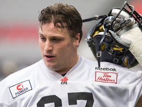 Hamilton Tiger-Cats offensive linesman Peter Dyakowski knows the Ottawa RedBlacks will be prepared for this afternoon’s game regardless of who starts at quarterback. (IAN KUCERAK/POSTMEDIA NETWORK)