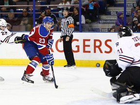 Edmonton's Colton Kehler (left) shoots on Red Deer's goaltender Rylan Toth during the second period of a WHL hockey game between the Edmonton Oil Kings and the Red Deer Rebels in Edmonton, Alta. on Sunday September 27, 2015. Ian Kucerak/Edmonton Sun/Postmedia Network