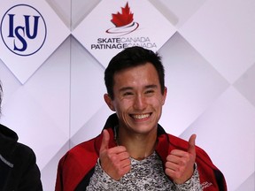 Patrick Chan of Canada reacts at his score following his Men's Free program performance at Skate Canada International in Lethbridge, Alberta October 31, 2015. (REUTERS/Jim Young)