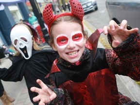 PETE FISHER / Northumberland Today
Nine-year-old Jailynn Pearn (front) and her sister Alyssa (age 8) were scaring things up throughout Cobourg's downtown Saturday.