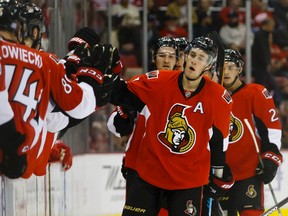 Ottawa Senators center Kyle Turris (7) celebrates with the bench after scoring a goal in the first period against the Detroit Red Wings at Joe Louis Arena Friday, Oct. 30, 2015. (Rick Osentoski-USA TODAY Sports)
