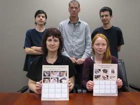 Sarnia conservationist Jeff Bender, centre, has started up the Canadian Institute for Bat Research with plans to build a local rehabilitation and education centre. The newly-formed group has launched its "Toonies for Bats" calendar campaign to support its efforts. Pictured here in the back row are Nic Vandersteen, Bender and Dan Vandersteen, with Cindy Windover and Venessa Brideau in the front. (Barbara Simpson, The Observer)