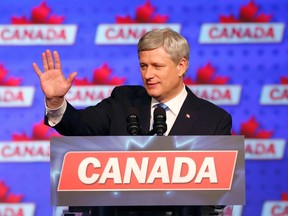 Canada's Prime Minister Stephen Harper waves as he gives his concession speech after Canada's federal election in Calgary, Alberta, October 19, 2015. REUTERS/Mark Blinch