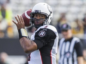 Ottawa RedBlacks quarterback Henry Burris throws a pass against the Hamilton Tiger-Cats during the first half of their CFL football game in Hamilton, Ont.., Nov. 1, 2015.    REUTERS/Mark Blinch
