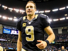 New Orleans Saints quarterback Drew Brees (9) runs off the field following a win against the New York Giants in a game at the Mercedes-Benz Superdome. The Saints defeated the Giants 52-49. Derick E. Hingle-USA TODAY Sports