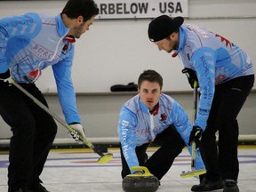 Tyler Morgan, left, and Jamie Farnell prepare for skip Mark Bice's instructions as he throws a rock during the Huron ReproGraphics Oil Heritage Classic at the Sarnia Golf and Curling Club Sunday afternoon. Bice's rink reached the final but lost 6-4 to John Shuster. (Terry Bridge, Sarnia Observer)