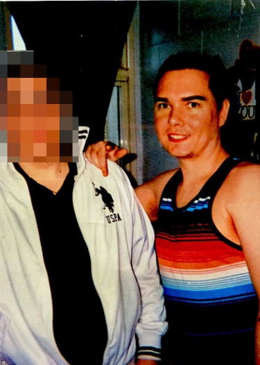 Luka Magnotta, right, poses with an unknown friend at Archambault Institution in Quebec.