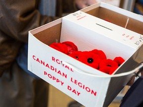 John Dempsey, associate member of Branch 138 of the Royal Canadian Legion at the entrance to the Pen Centre Zehrs location as the poppy drive started Friday October 30, 2015 in St. Catharines. Bob Tymczyszyn/Postmedia Network