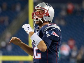 Tom Brady of the New England Patriots reacts before a game against the Miami Dolphins at Gillette Stadium in Foxborough, Mass., on October 29, 2015. (Jim Rogash/Getty Images/AFP)