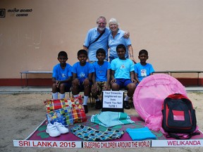 Chris and Gail Hills, long-term residents of Tuckersmith Township display the bed kits from the Sleeping Children Around The World organization. The couple has been part of the charity association for decades this year they focused on families in Sri Lanka.(Contributed photo)