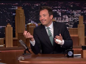 Jimmy Fallon returns to the Tonight Show on July 13, 2015 after injuring his finger. (Handout)