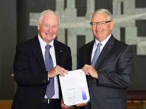 From the (left) the Governor General of Canada, David Johnston presents Doug Procter with the Governor General’s Caring Canadian Award on October 6.(Contributed photo)