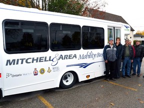 Members of the Mitchell and Area Mobility Bus Committee posed with their new purchase Oct. 29. Pictured (from left): Jerry Sykes, Vicky Wolfe-Hinz, Ivan Pol, Ray McNaught, Bob Norris and Dick Frier. GALEN SIMMONS/MITCHELL ADVOCATE