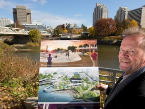 Mark Johnson of Civitas+Stantec, a Denver-based architect, holds up drawings of the forks of the Thames after being awarded as the winning design in the Back to the River competition in London. (MIKE HENSEN, The London Free Press)